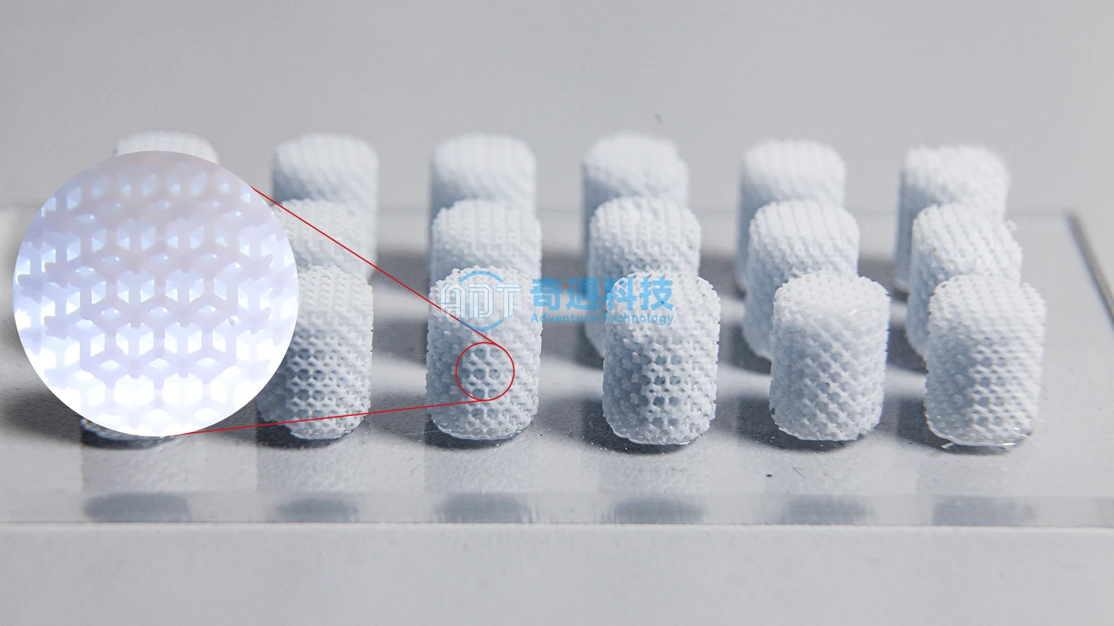 Hydroxyapatite bone graft samples printed on an ADT ceramic DLP printer, with a magnified view of the porous lattice
