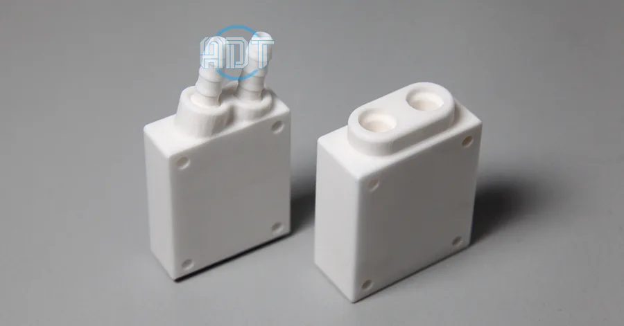 Alumina heat exchange blocks with hose ports