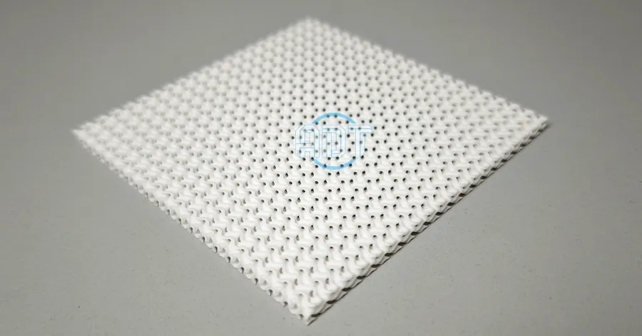 Perforated alumina setter plate