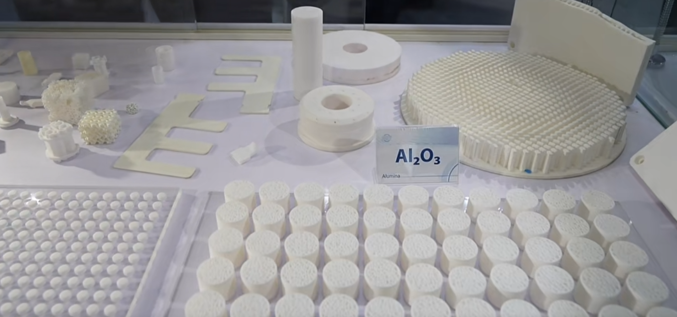 Real-world ceramic AM applications in electronics and aerospace.